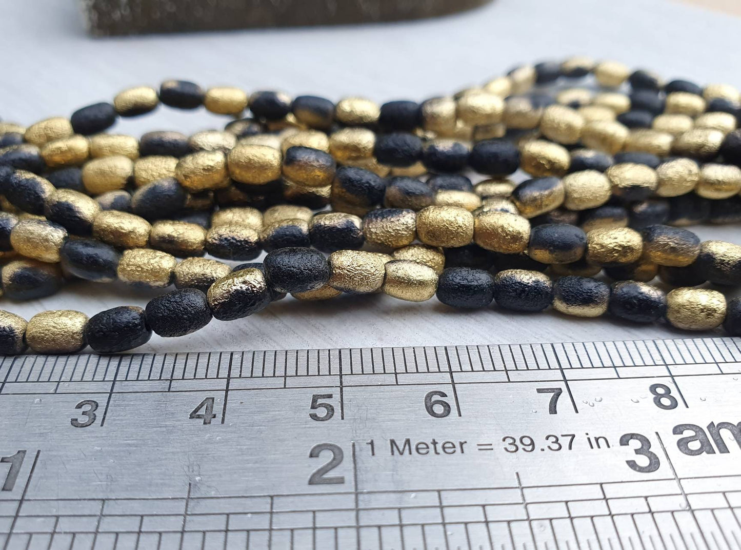 4 x 6mm Black Gold Etched Rice Beads | Full Strand of 50 Beads
