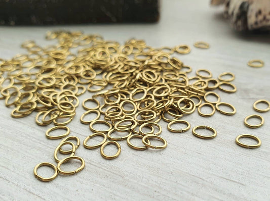 4x5mm OD Oval Brass Jump Rings | 22 Gauge | Raw Brass Findings | 50 / 100 Pcs