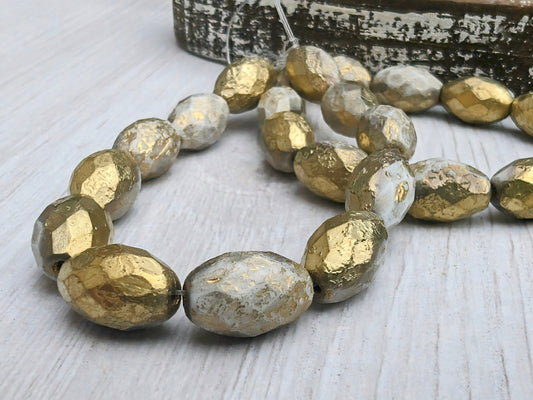 8 x 12mm Faceted Oval in White with a Gold and Etched Finish | Full Strand of 12 Beads