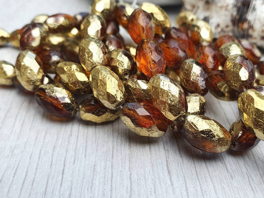 8 x 12mm Faceted Oval in Dark Honey with Gold and Etched Finishes  | Full Strand of 10 Beads